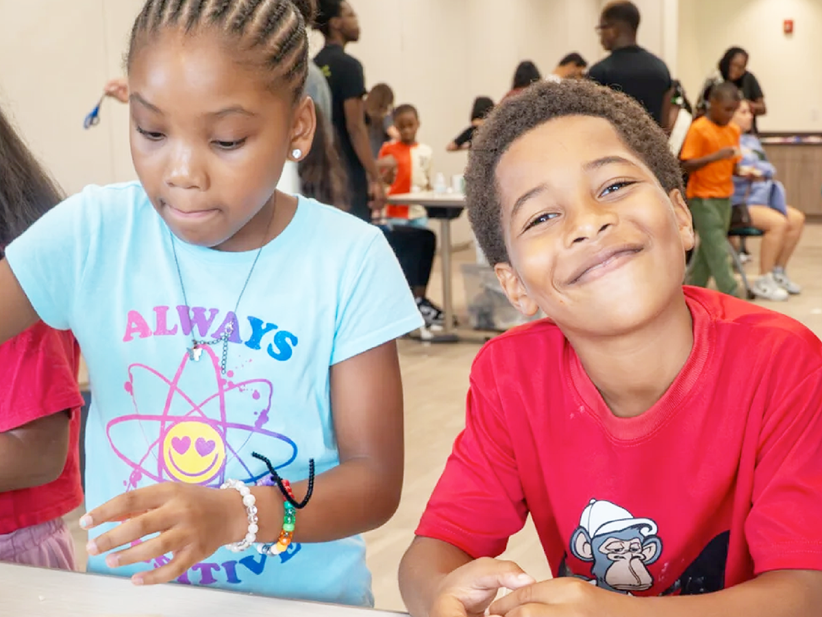 YFS_001_4x3 Two children working and playing during an OIC-SFL youth workshop